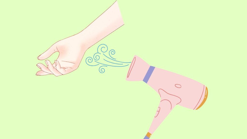 手首にドライヤーの温風を当てているイラスト